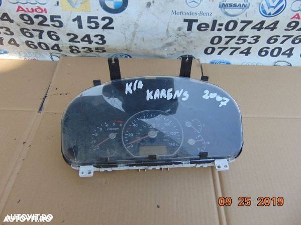 Ceasuri bord kia Carens 2006-2013 dezmembrez kia Carens 2 motor 2.0 - 1