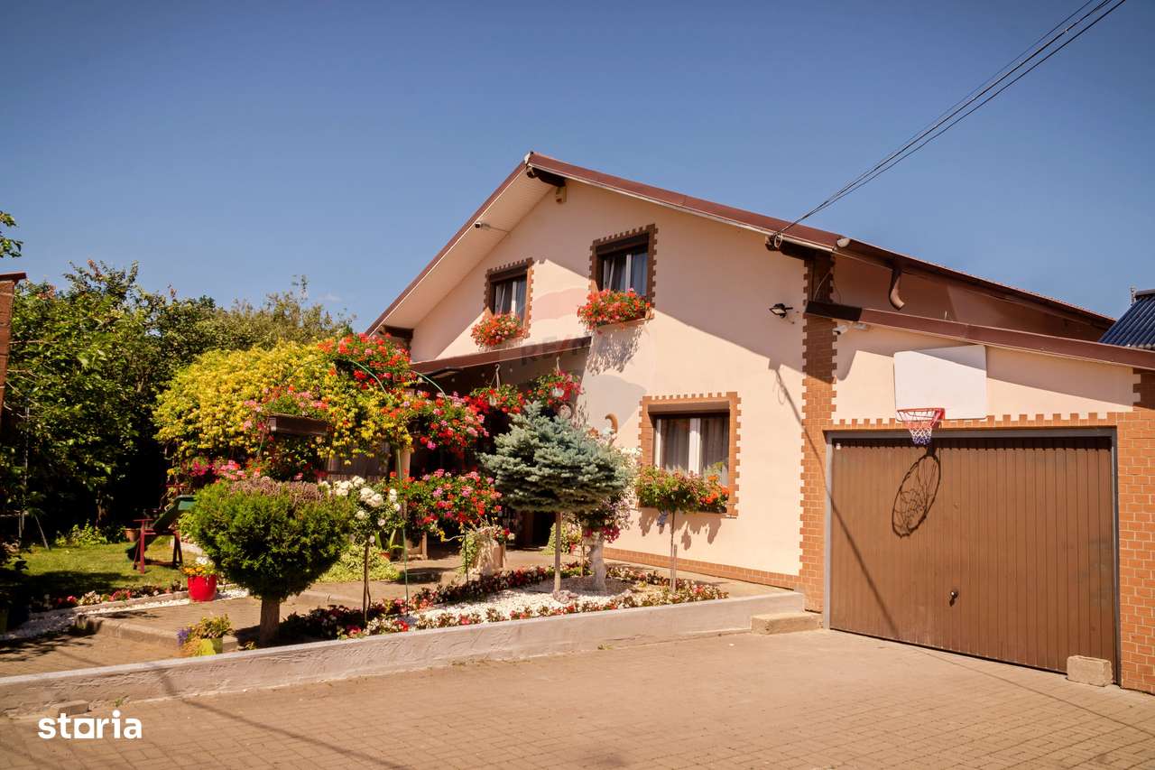 Casa de vanzare in Voitinel in promotie de sarbatori - Imagine principală: 4/16