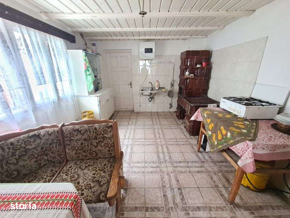 Vanzare casa cu teren generos, in centrul comunei Musetesti - Imagine principală: 4/10