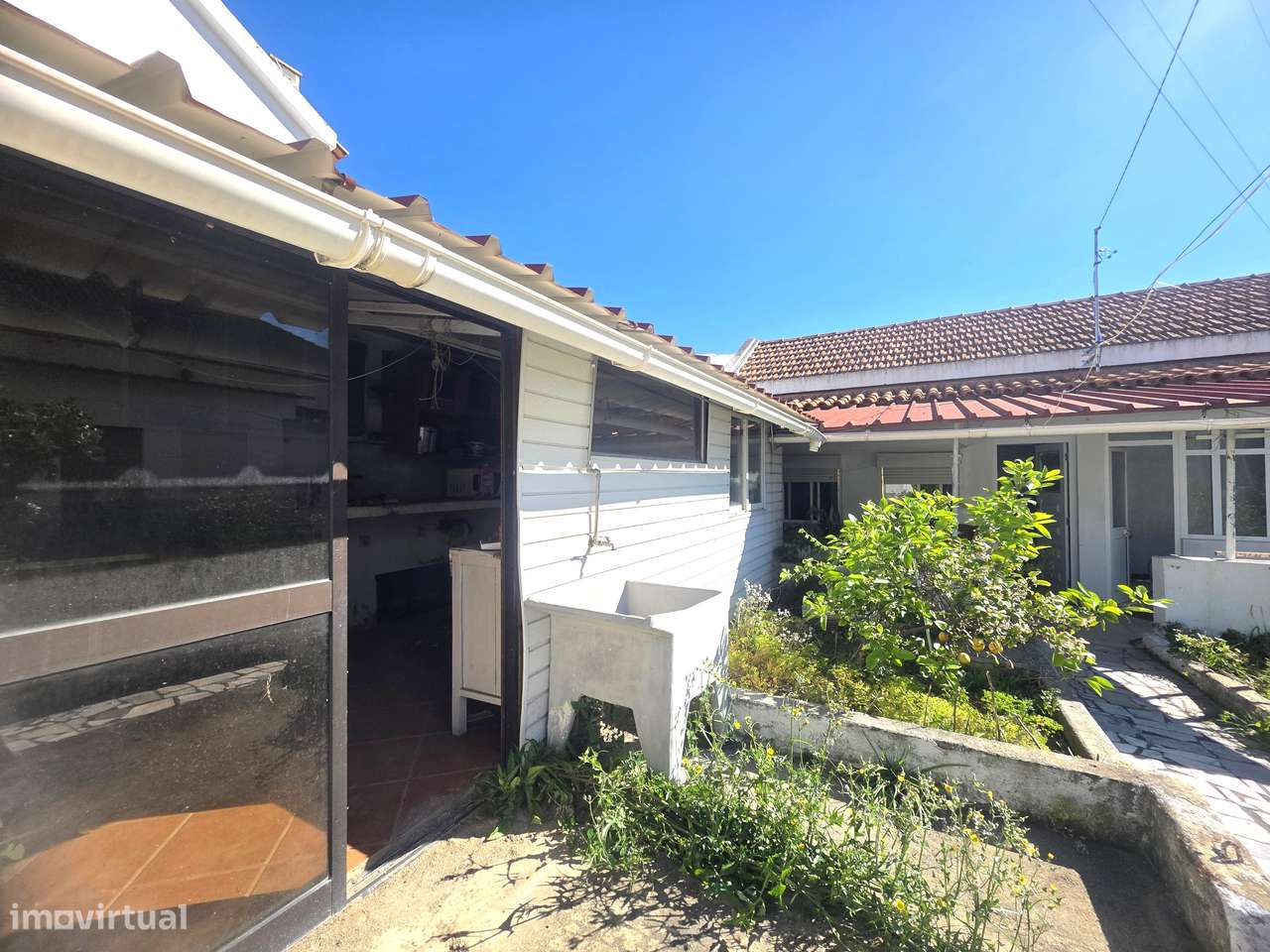 Lote de Terreno com Moradia – Oportunidade de Investimento-21