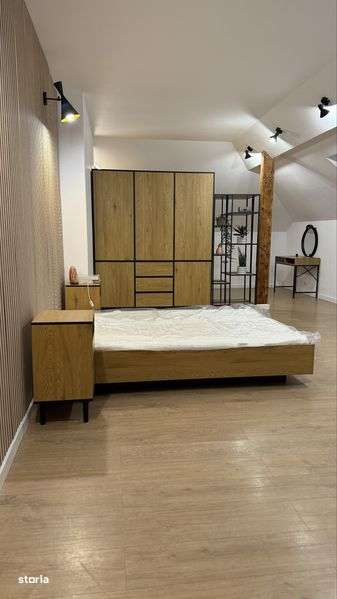 Locuinta spatioasa 70 mp dispusa pe doua nivele cu mansarda in centru - Imagine principală: 4/8