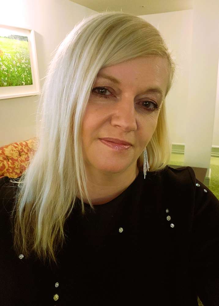 Logo: Monika Rędzińska Nieruchomości