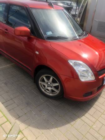 Suzuki Swift 1.3 Club - 3