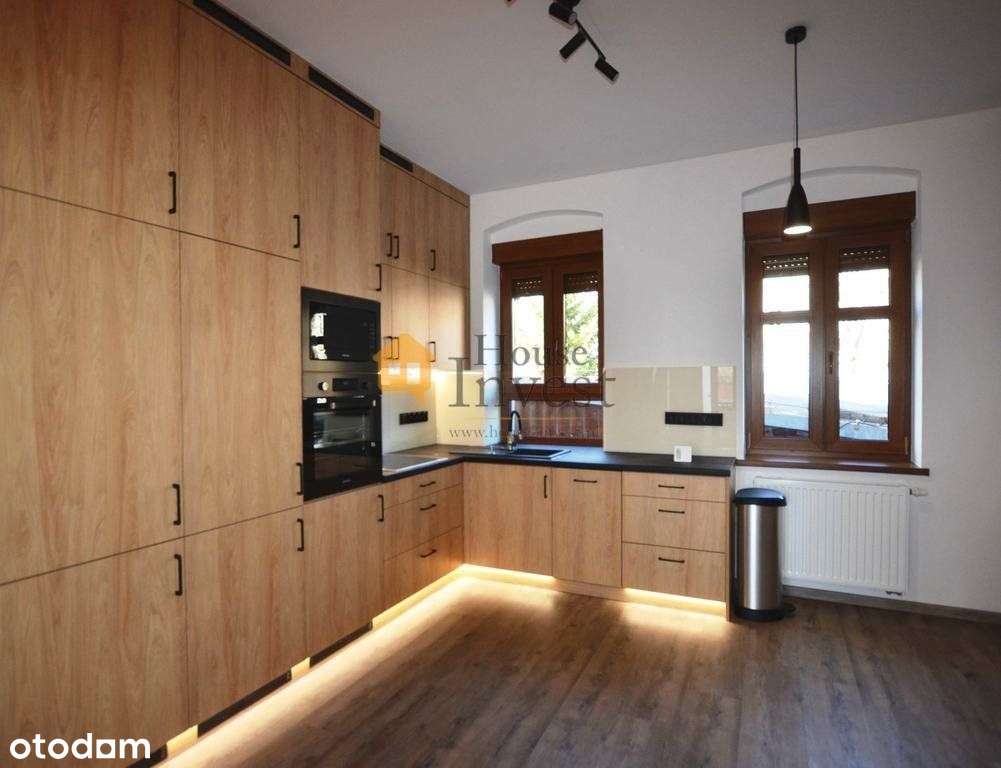 Gotowa inwestycja: 2 mieszkania, lokal, garaże - Pełny obrazek: 2/8