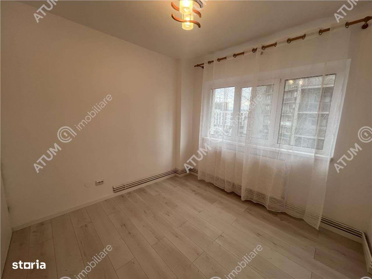 Apartament renovat cu 2 camere decomandate si balcon zona Rahovei - Imagine principală: 4/11