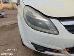 Far Opel corsa D faruri stanga dreapta dezmembrez Opel Corsa d 1,0 - 1