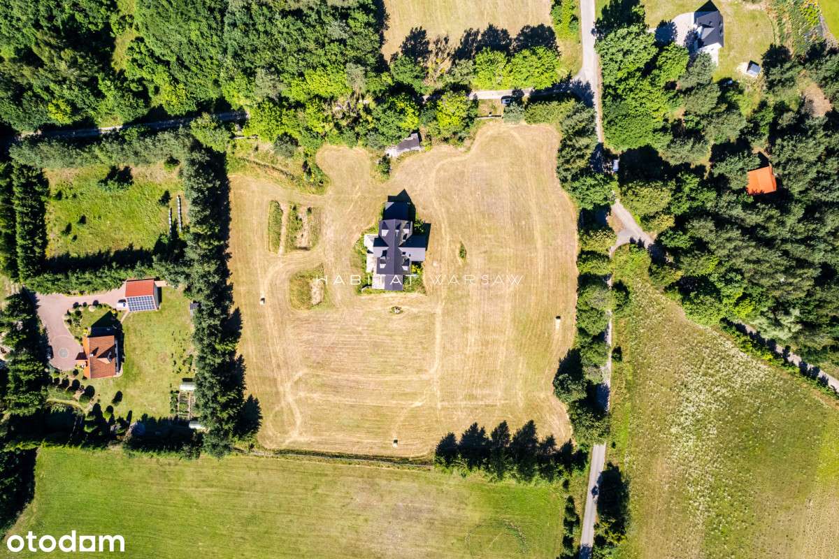 Dom z potencjałem w otoczeniu jeziora i lasu-16