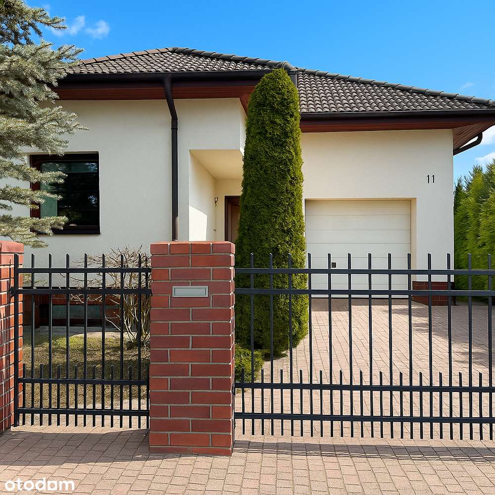 Komfortowy dom z poddaszem, ogrodem i garażem | Kiekrz-1