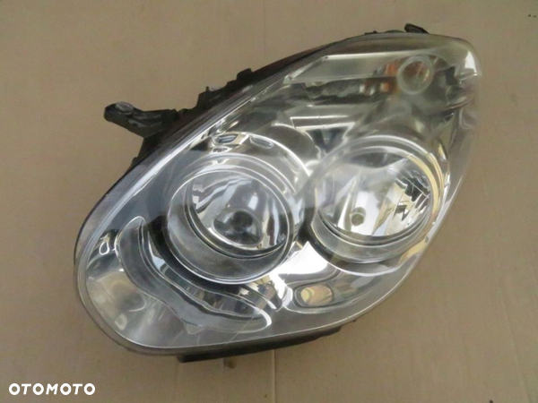 REFLEKTOR PRAWY LEWY FIAT DOBLO II 10-15R UK - 13