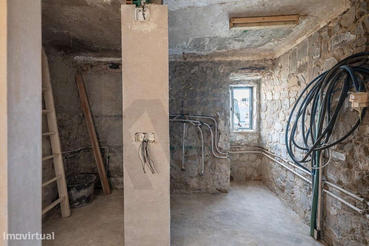 T0 remodelado na Madragoa - Estrela - Grande imagem: 4/13