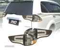 FAROLINS PARA MITSUBISHI MONTERO SPORT 09 LED PRETO - 1