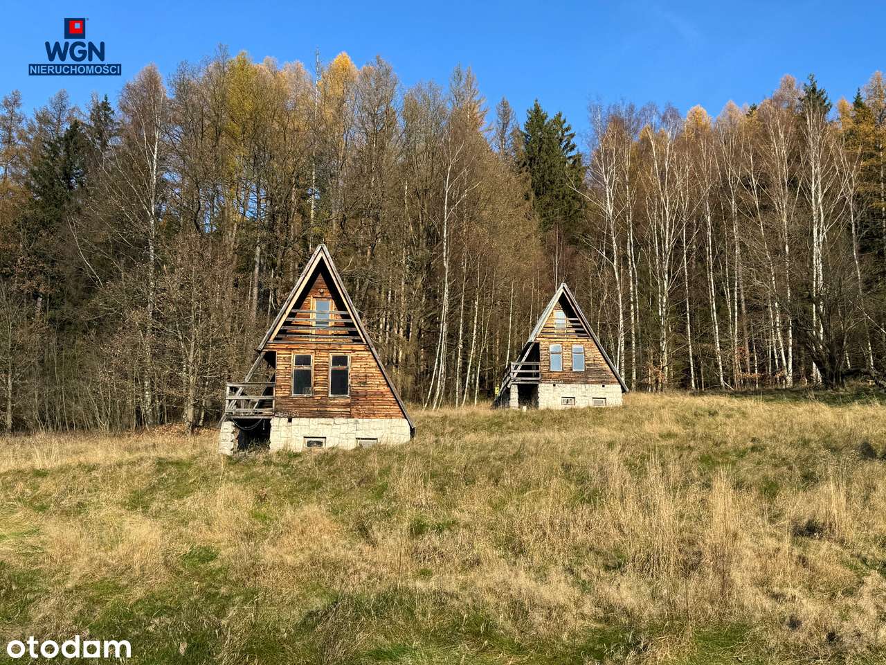 Grunt zabudowany 10-ma domkami nad jeziorem - na sprzedaż.-4