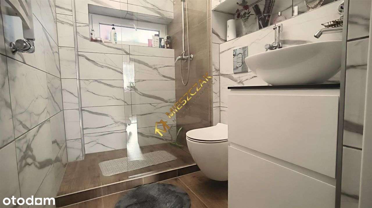 Częśc domu z ogrodem i dwoma lokalami użytkowymi w-11