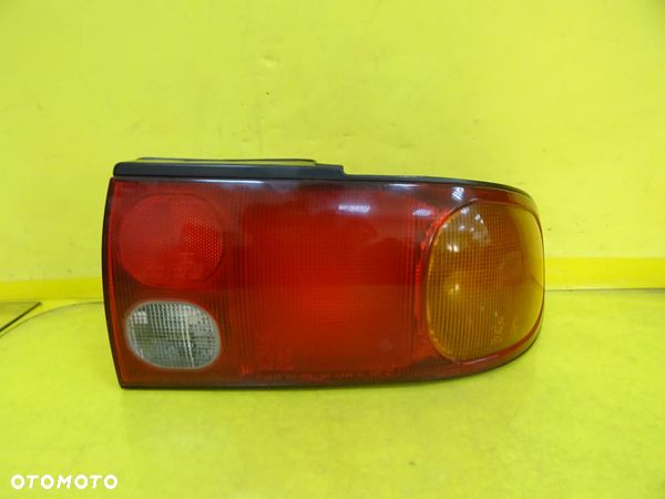 LAMPA PRAWY TYŁ MITSUBISHI LANCER V 92-96 NR573 - 1