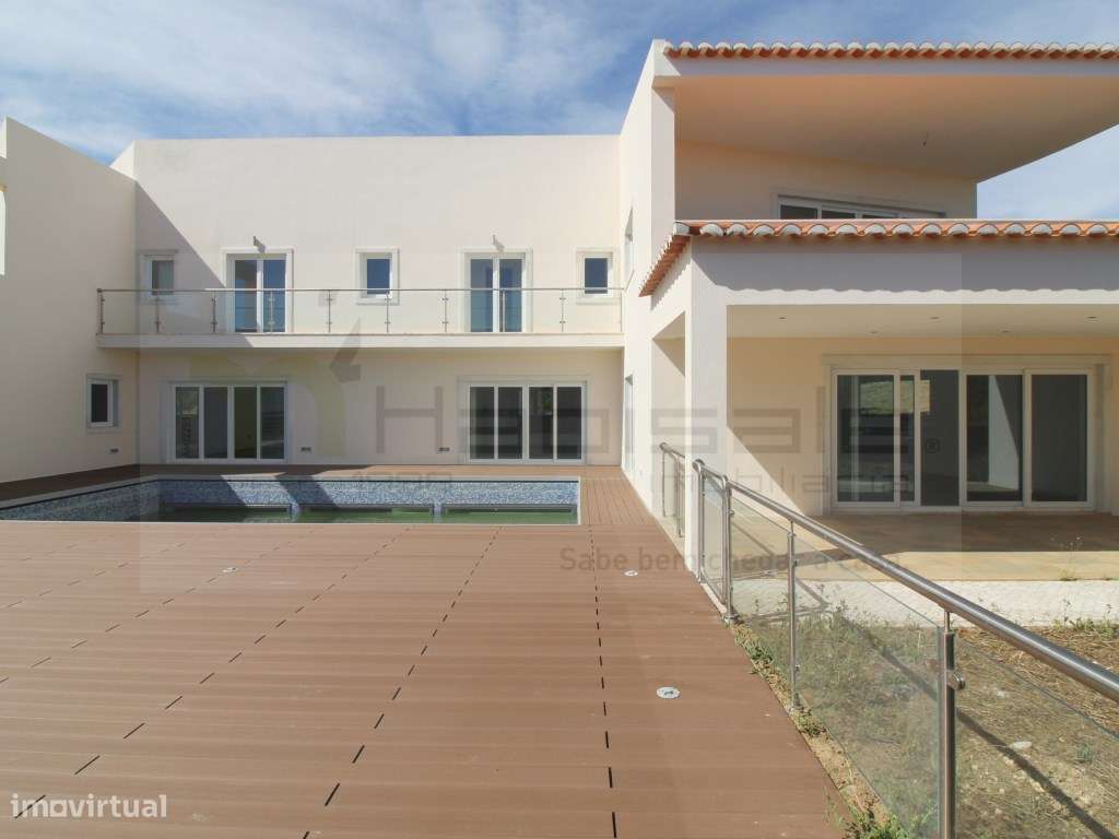 Moradia T4 com lote de 1700 metros no Belas Clube Campo - Grande imagem: 5/53