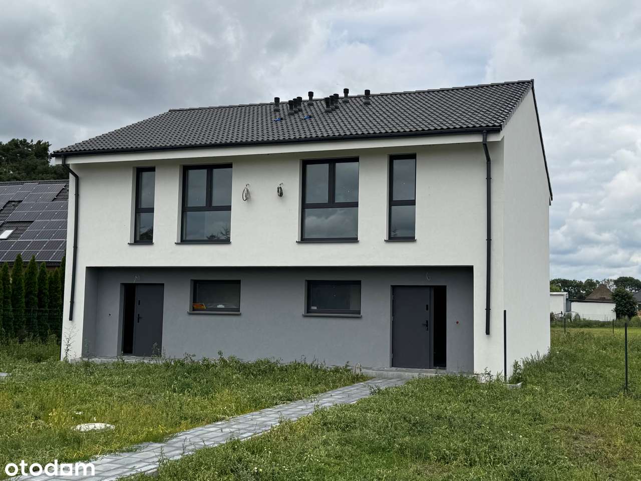 Nowoczesny Dom w zabudowie dwulokalowej-0