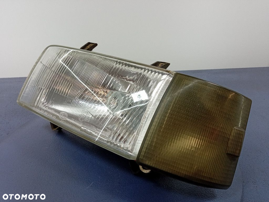 VW T4 REFLEKTOR LEWY LAMPA EU 302-136 369-00 - 4