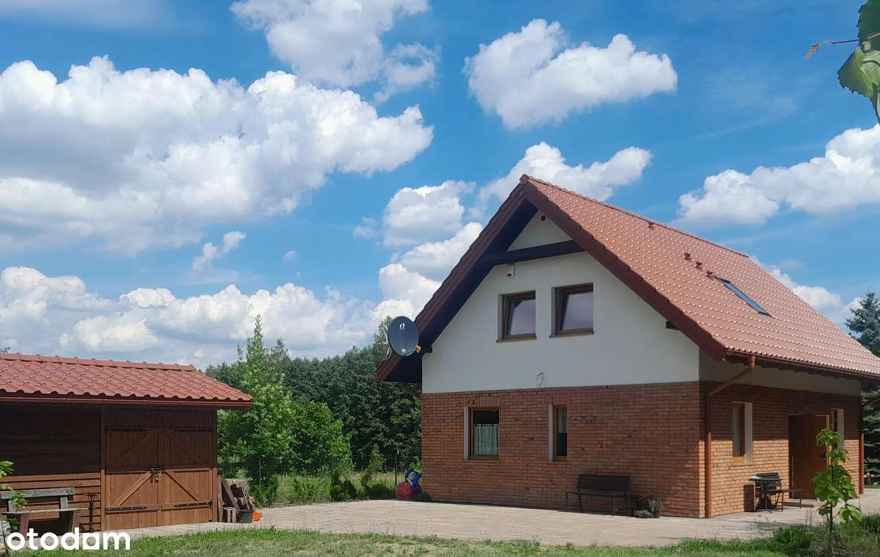 Dom między jeziorami Świętajno i Brajnickie z własnym pomostem