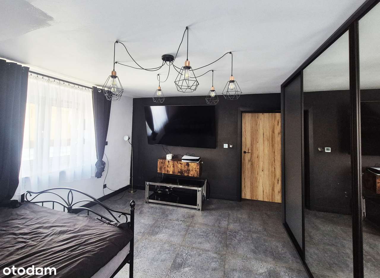 Duże mieszkanie na parterze z dwoma miejscami parkingowymi na własność-5