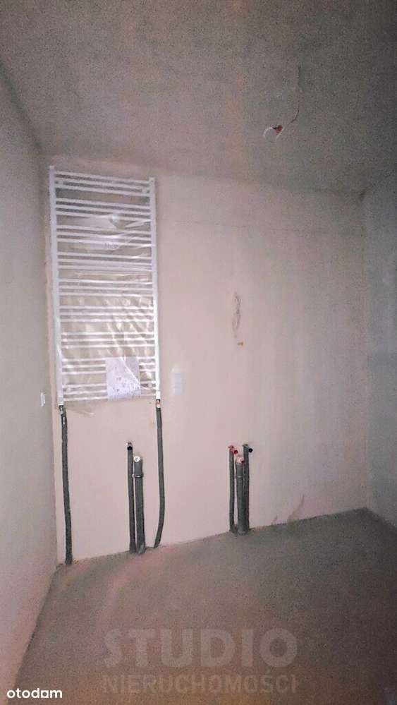 Z ogródkiem 1 pok. Stan deweloperski Garaż-6