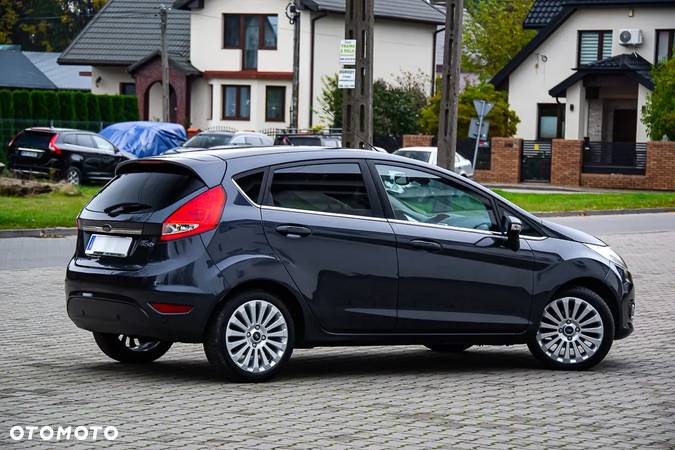 Ford Fiesta 1.4 Ghia - 22