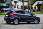 Ford Fiesta 1.4 Ghia - 22