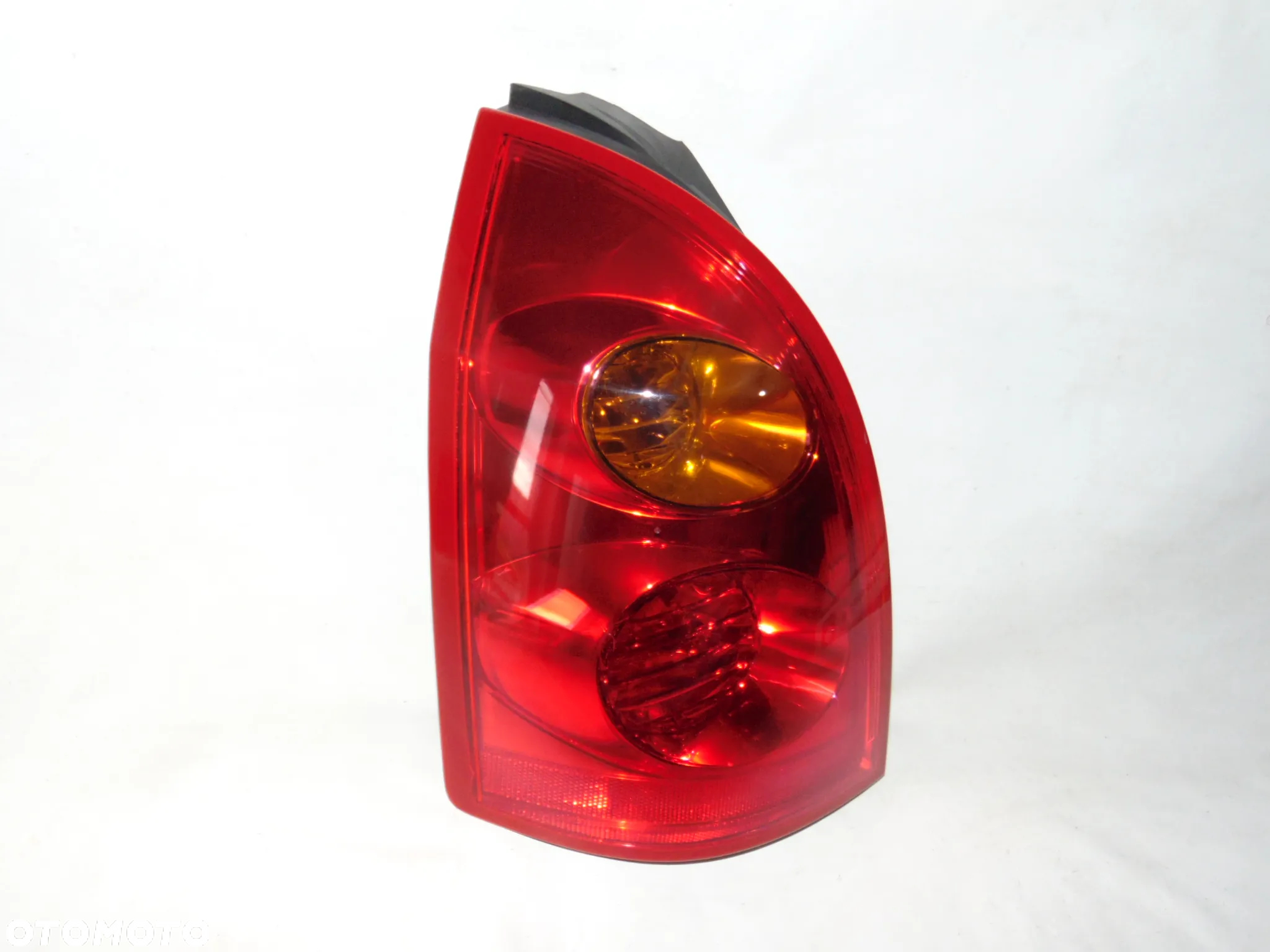 ORYGINAŁ lampa tylna tył lewa Nissan Primera P12 kombi 02-07r EUROPA - 2