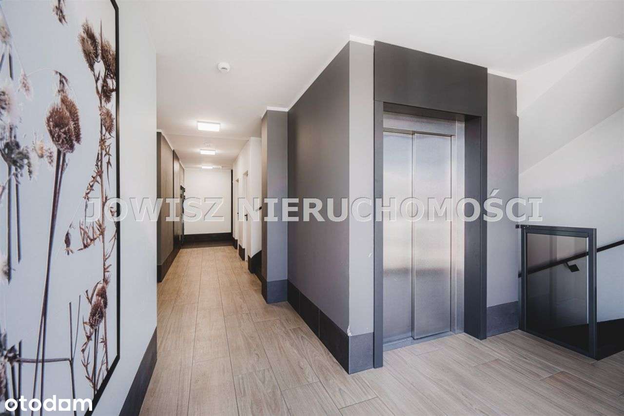 53,53 m2 ul 4 Pory Roku,z miejscem postojowym-12