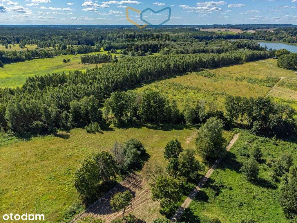 Działka budowlana nad jeziorem z dostępem do plaży-13