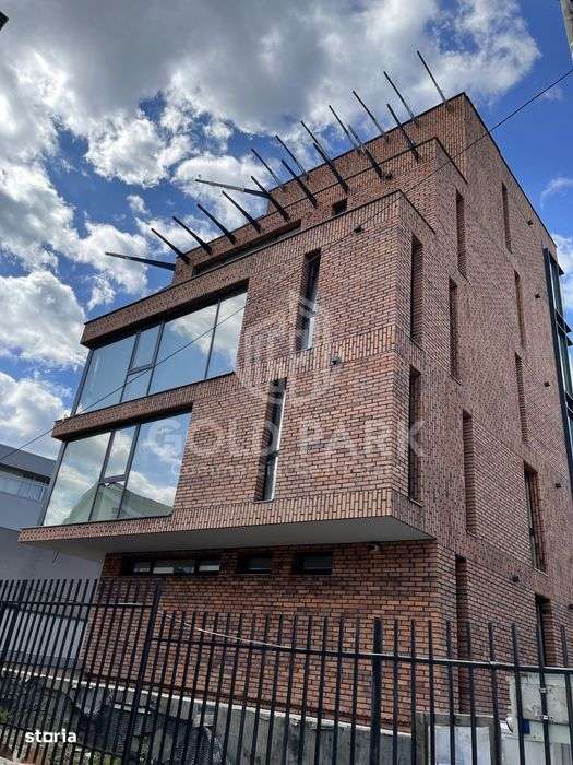 Spatiu de Birouri/Cladire de Birouri-Zona Europa-Garaj/Parcari/Curte - Imagine principală: 2/17