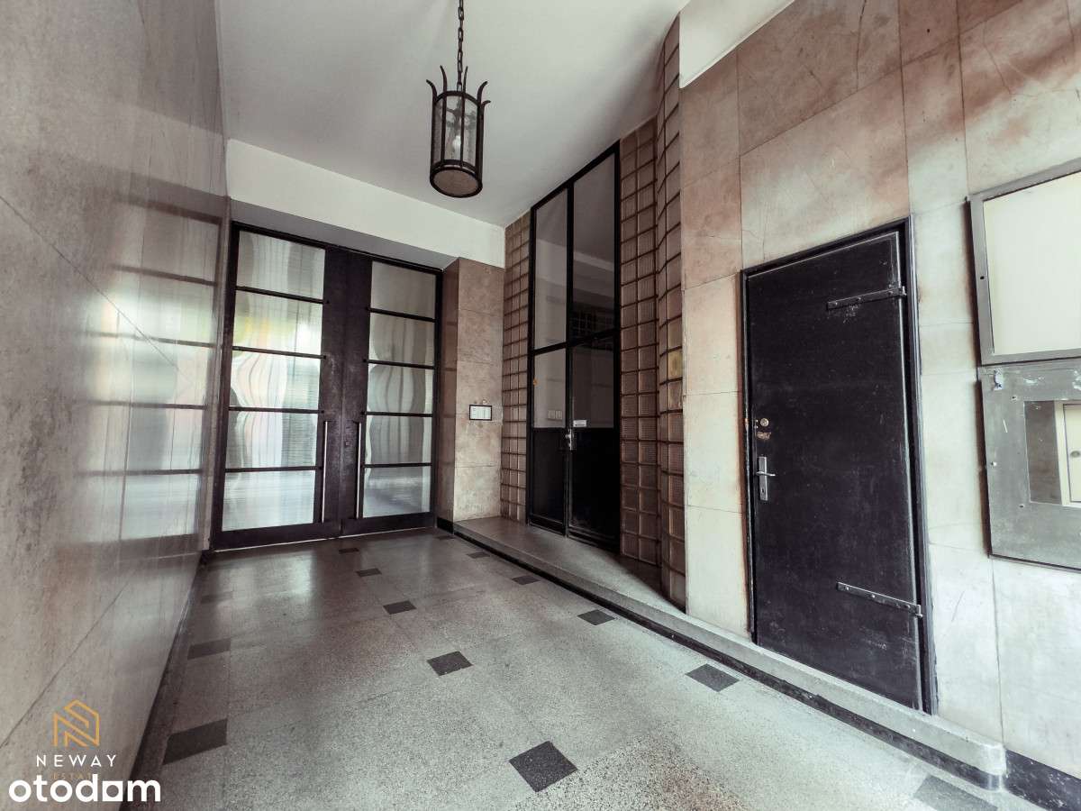 Apartament w modernistycznej kamienicy z balkonem-16