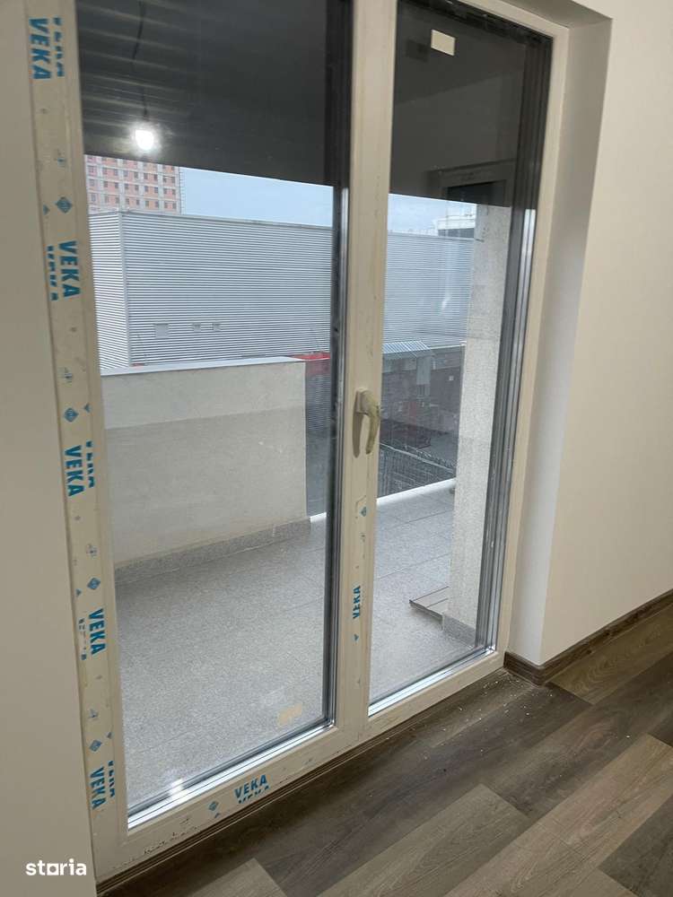 Apartament 2 cam dec, bucatarie separata etaj 1 cu parcare subterana-6