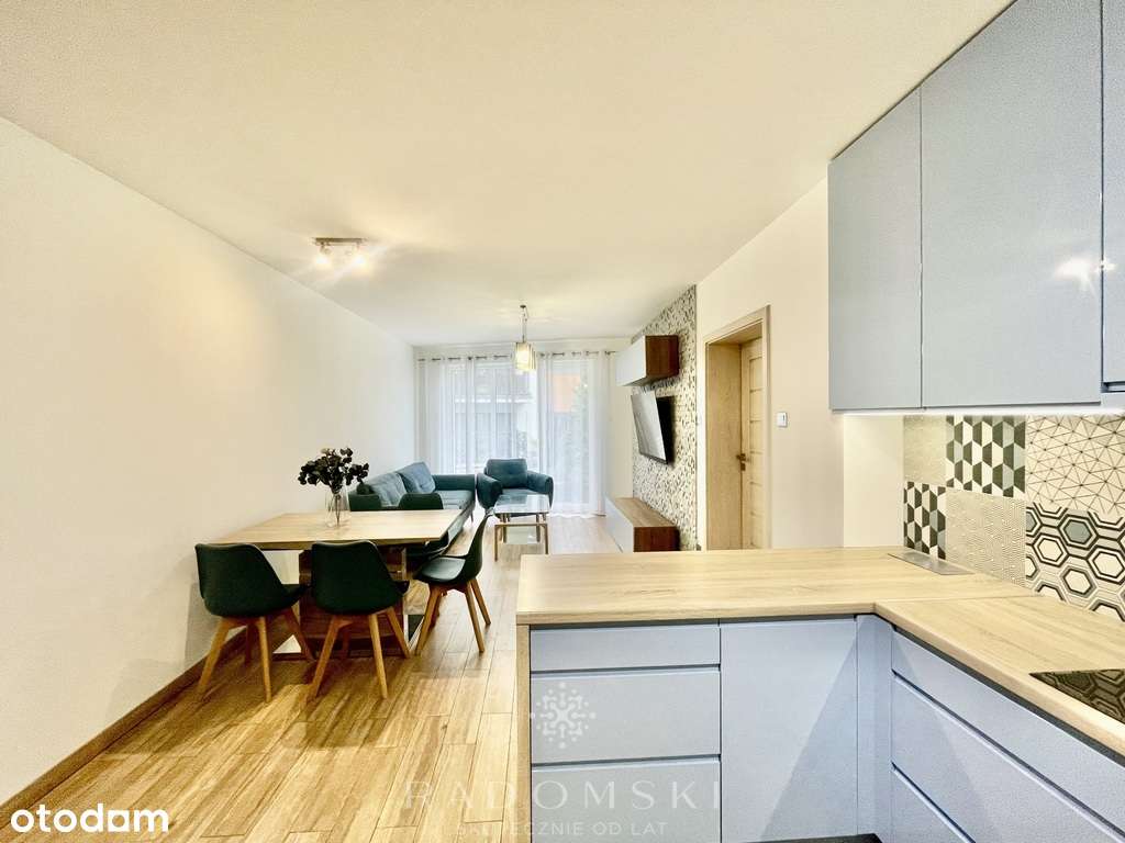 Apartament 3-pok. z ogródkiem i miej. postojowym-1