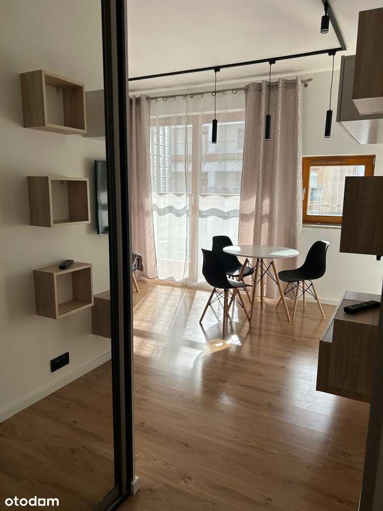 Przytulna kawalerka  z wydzieloną sypialnią , balkon 10m, ul. Chełmska - Widok 2