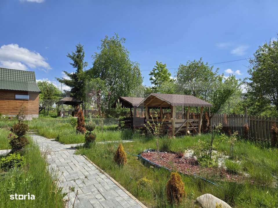 Cabana lemn cu 4 dormitoare, 120mp, teren intravilan de 1250mp - Imagine principală: 3/17