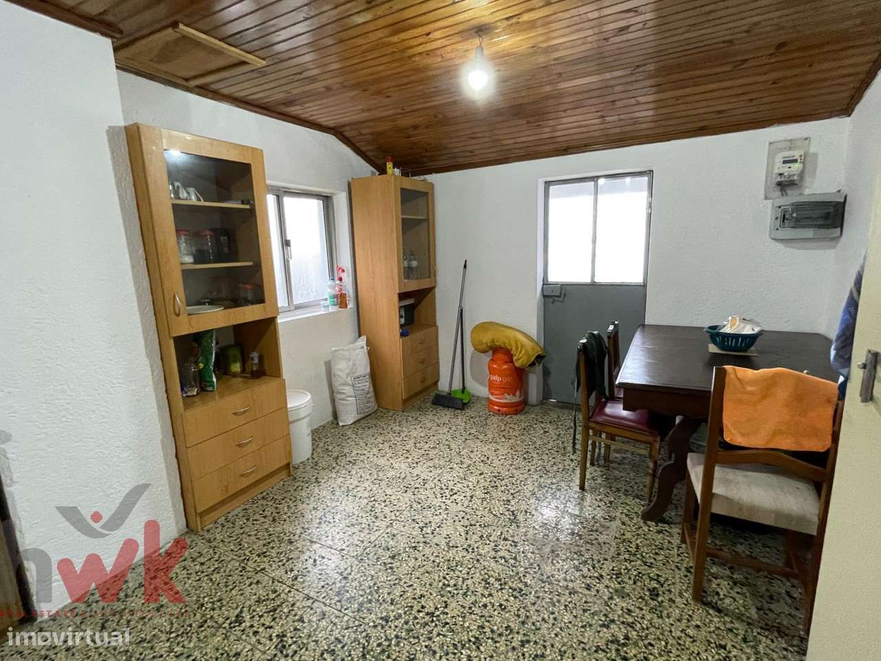 Casa dividida em 3 apartamentos com garagem-16