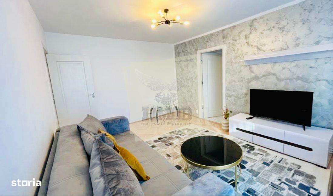 Apartament renovat etajul 2 cu 2 camere si balcon zona centrala - Imagine principală: 2/10