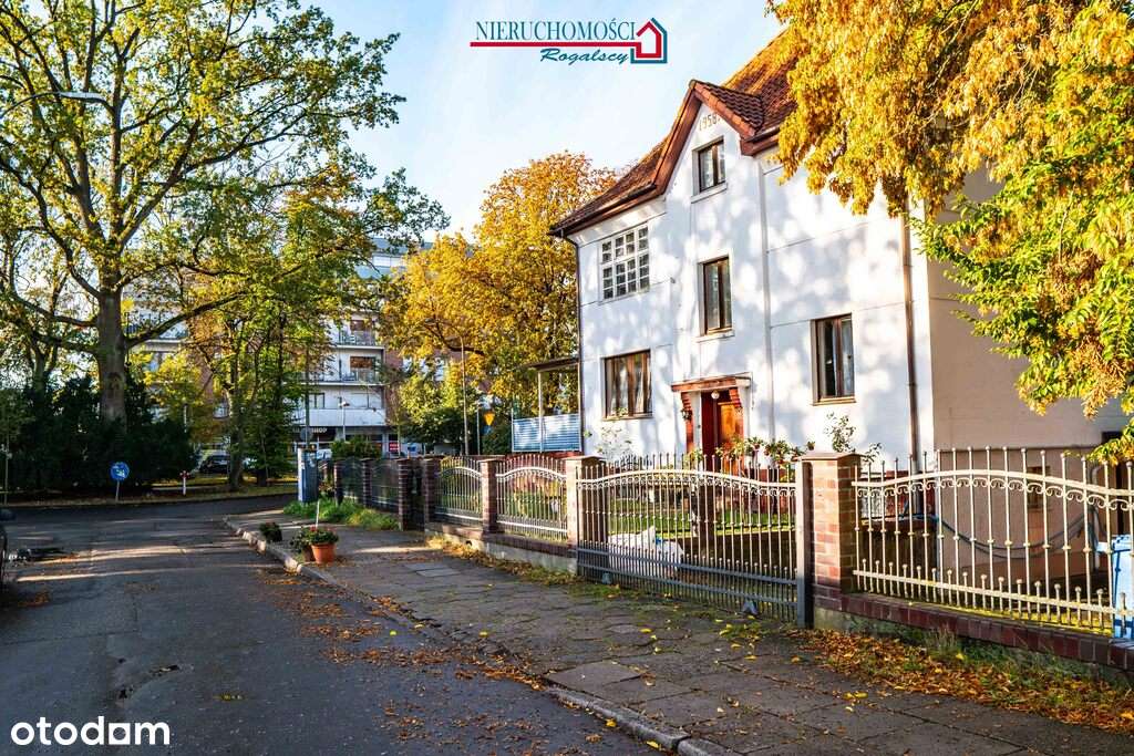 Część domu z garażem i ogródkiem-1