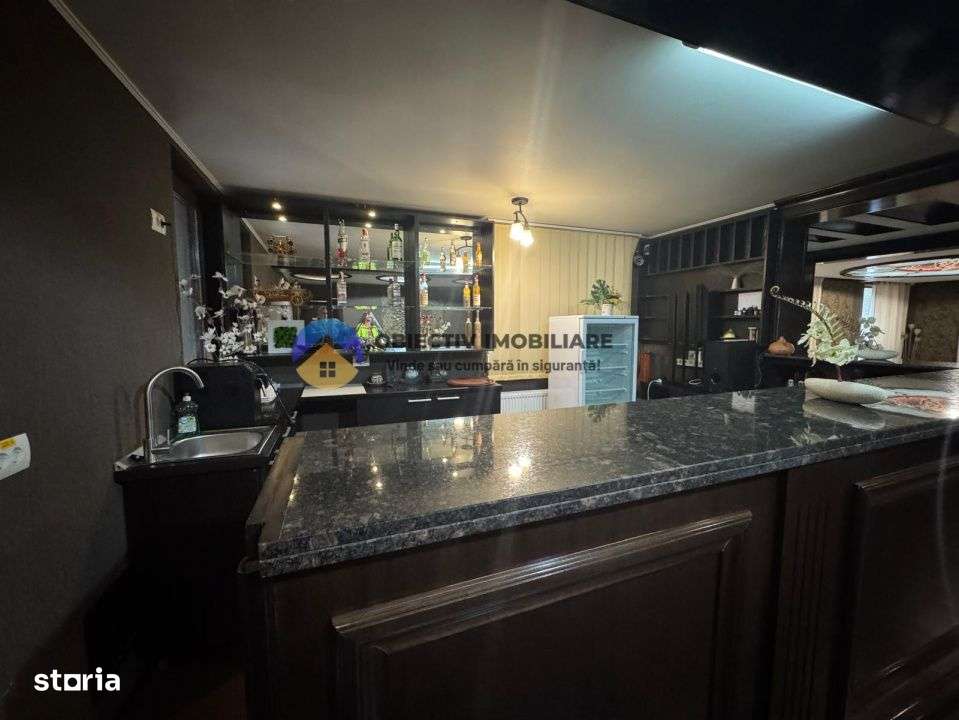 Casa cu posibilitate transformare in pensiune si teren de vanzare Piat-10