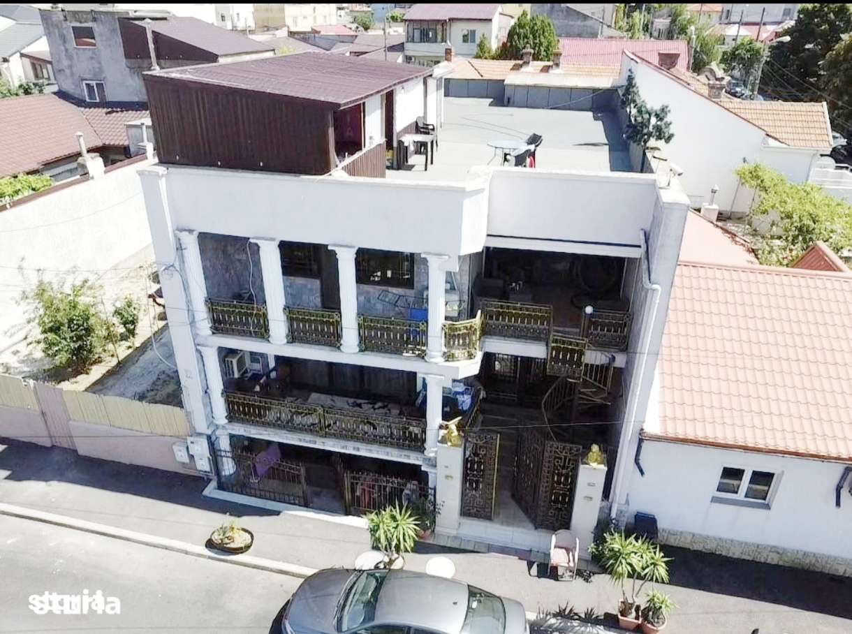 Casa D+P+E+terasa Tomis 2 cu 2 intrari, 6 camere, 2 bucătării, 3 bai.-0