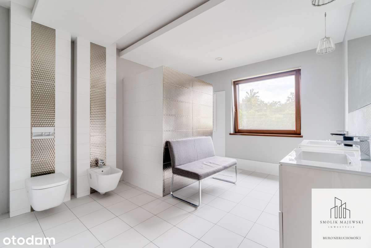 Rezydencja z basenem i pięknym ogrodem-14