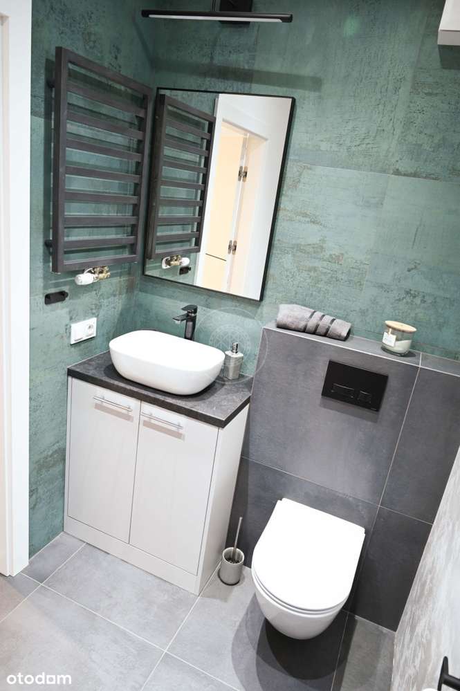 Kawalerka z ogródkiem + miejsce parkingowe!-7