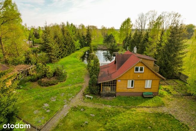 Urokliwe siedlisko w otoczeniu lasów i rzeki Pisy