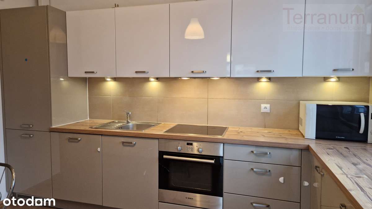 3 pokoje z miejscem postojowym Garażowa-4