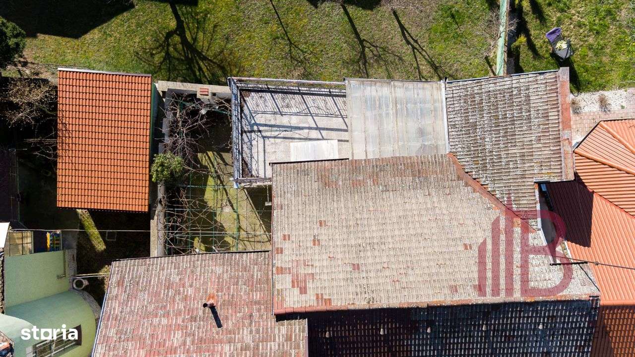 Casă compusă din 10 camere, locație utracentrală, destinații multiple!-5