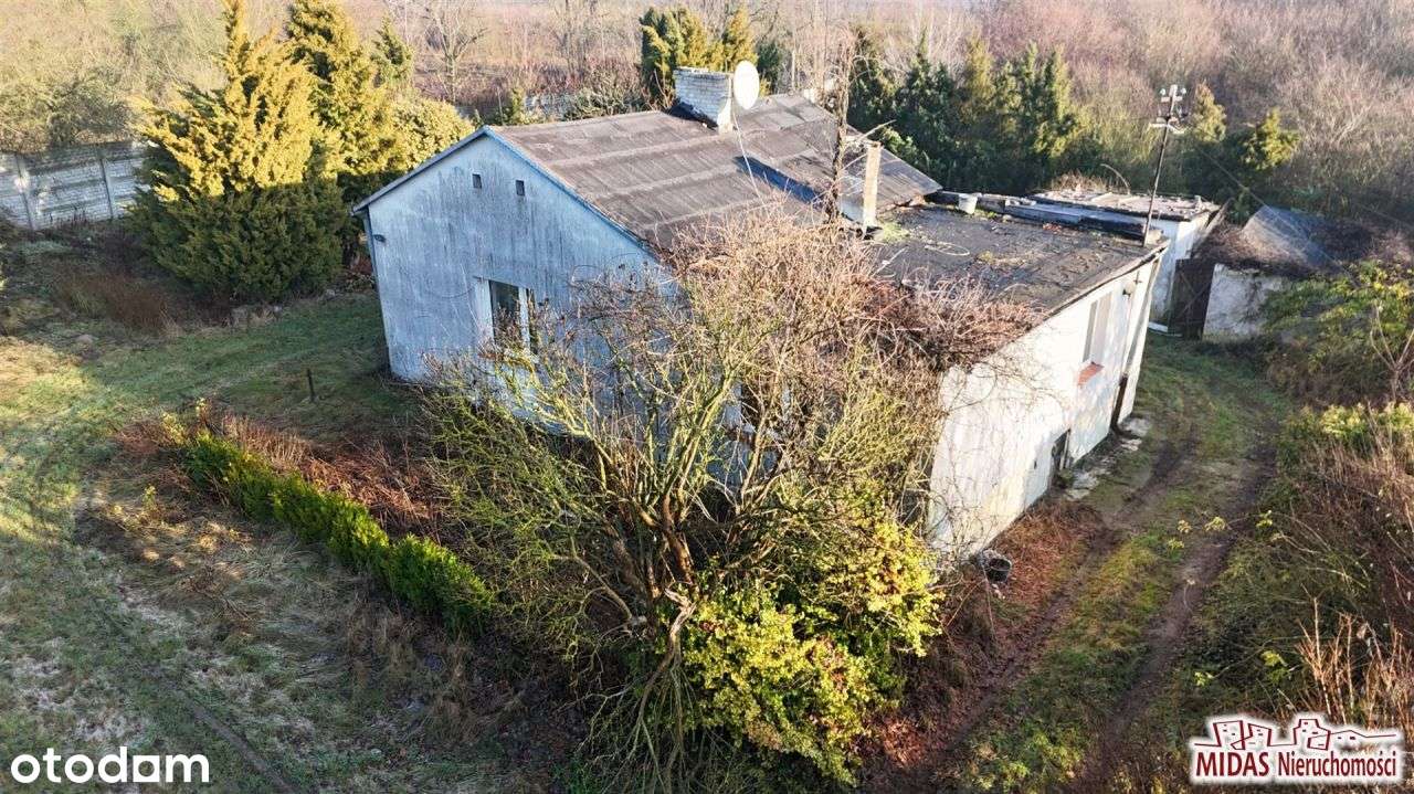 Dom do remontu na ładnej działce-7