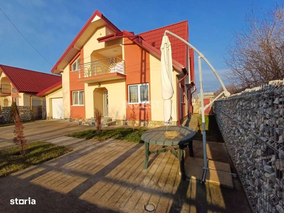 CASA CU 4 CAMERE , BECI SI GARAJ , 825MP TEREN , VOINESTI - Imagine principală: 5/19