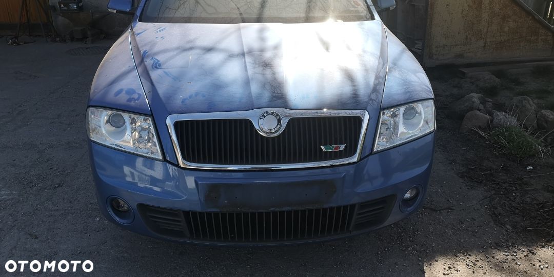 Lampa przednia prawa Skoda Octavia II soczewka anglik cała - 1