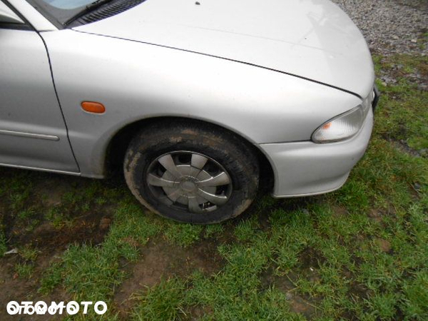 BłOTNIK PRAWY MITSUBISHI LANCER KPL 1994r - 2