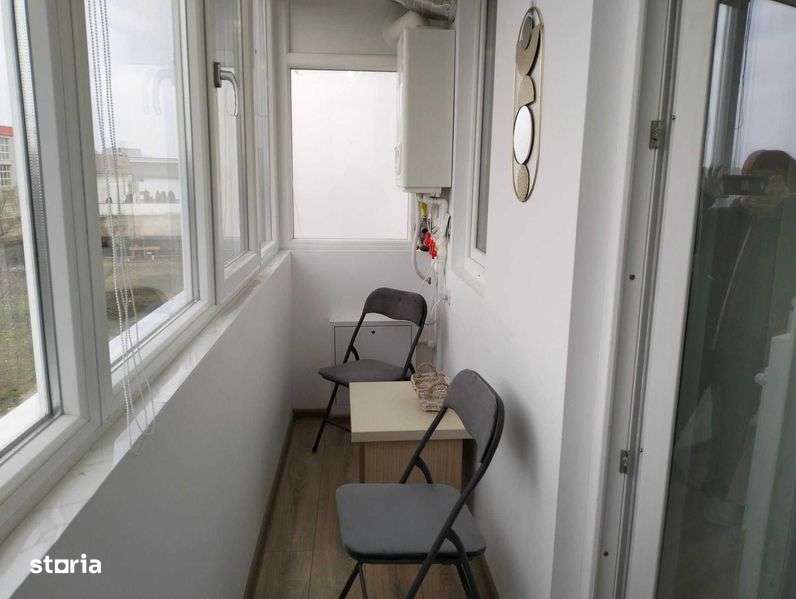 vanzare studio cu bucatarie si camera de zi open space - Imagine principală: 5/8